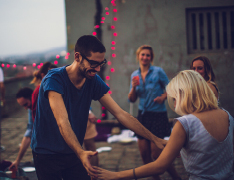 people dancing at backyard party